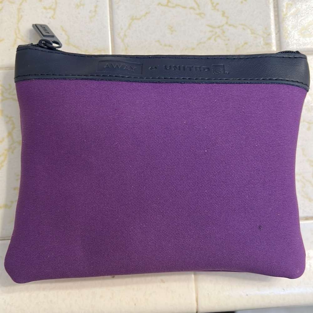 Away x united purple amenties bag